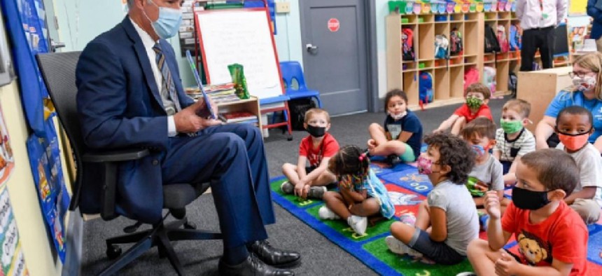 Sen. Bob Casey reads a book to a group of Pre-K students in Reading. 