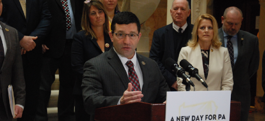 State Rep. Jim Struzzi speaks at a press conference