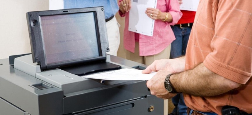 Optical voting machines, like this one in Florida, can provide both digital and printed ballots - Shutterstock