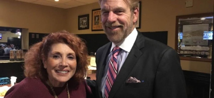 Sandra Schultz Newman, left, with sports personality Howard Eskin – from her Facebook page