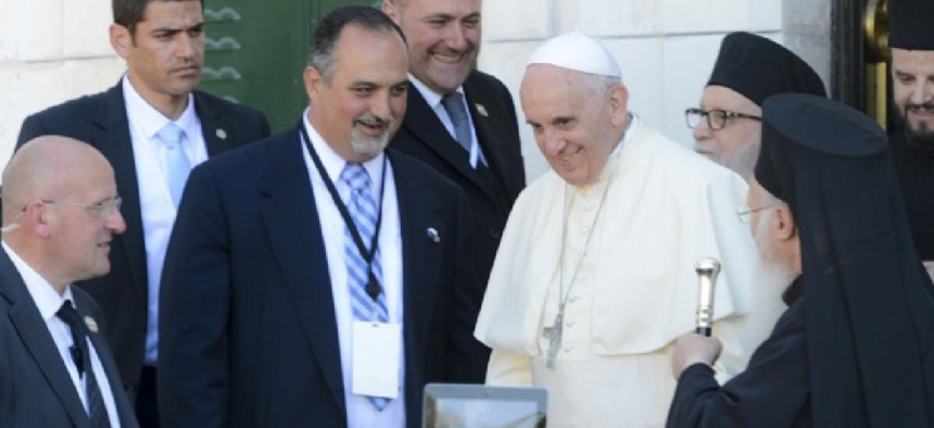 Karloutsos, third from left, with Pope Francis and Patriarch Bartholomew. Photo: MAK Consulting