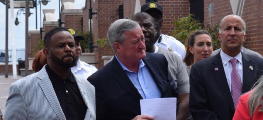 Philadelphia Mayor Jim Kenney is flanked by Councilmen Curtis Jones, Jr. (left) and Mark Squilla