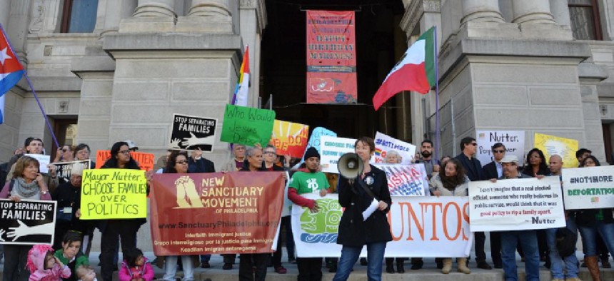 A pro-sanctuary rally, led by Sundrop Carter, outside Philadelphia City Hall – photo by Max Marin
