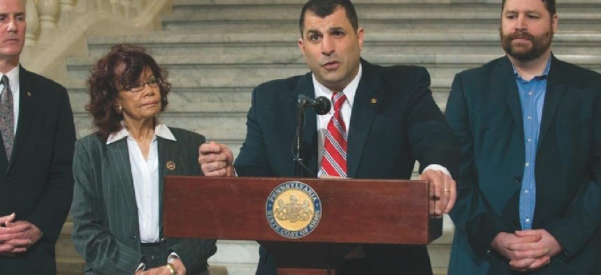 PA Rep. Mark Rozzi speaks at the lectern earlier this year.