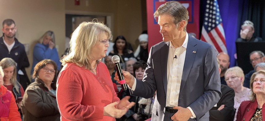 Dr. Mehmet Oz talks with a supporter