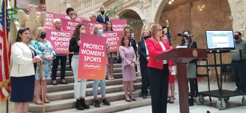 Supporters of the “Protect Women’s Sports Act” gather at the Capitol Tuesday.