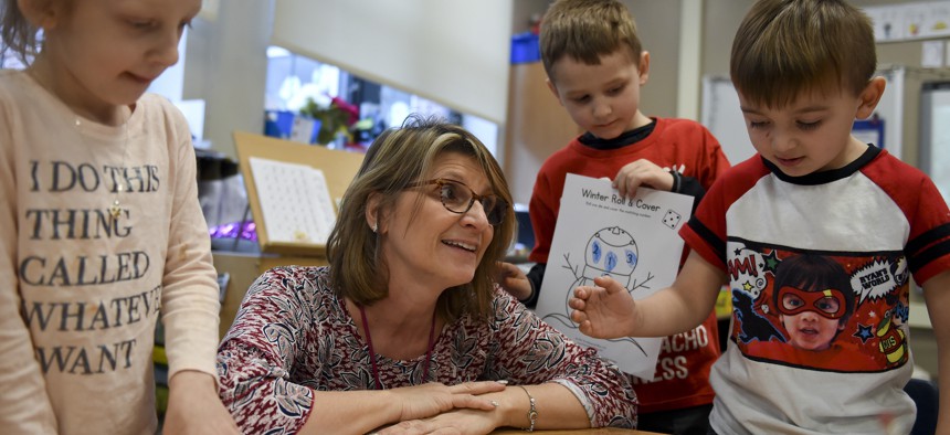 Jacinda Bartolucci is a kindergarten teacher at Rupert Elementary in the Pottstown School District. Here she is working with her students on a math exercise.