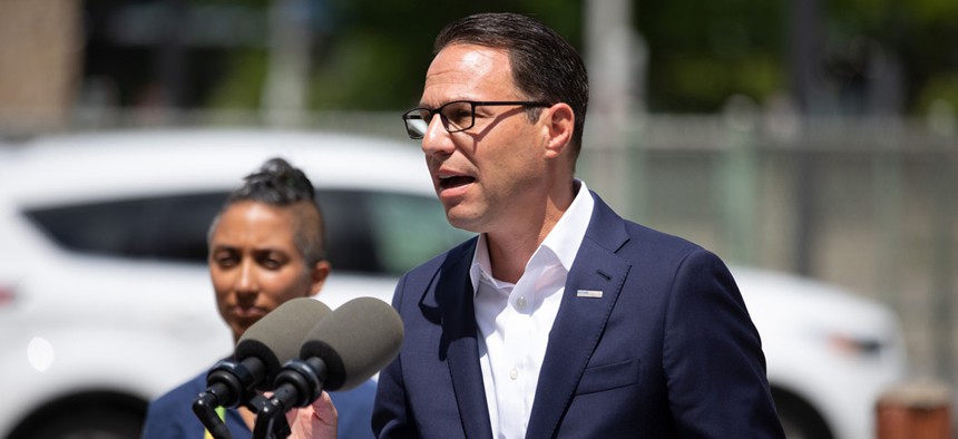 Attorney General Josh Shapiro speaking at a press conference