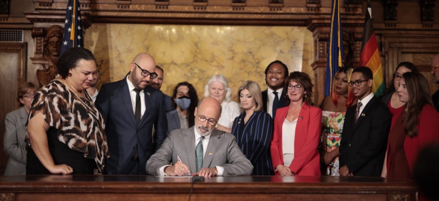 Gov. Tom Wolf signs an executive order discouraging the use of conversion therapy in Pennsylvania