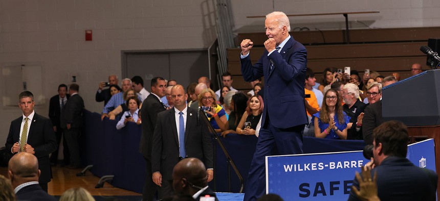 President Joe Biden raises his fists after speaking on his Safer America Plan at the Marts Center in Wilkes-Barre on Tues, Aug. 30.