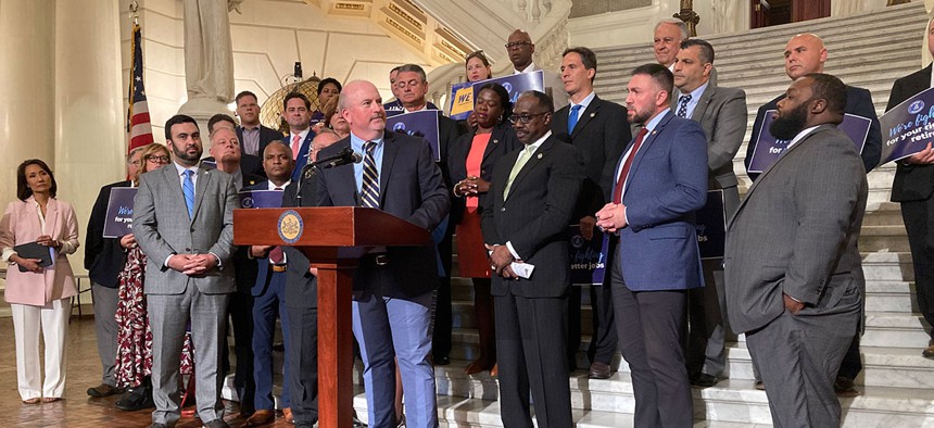 State Rep. Matt Bradford, the minority chair of the House Appropriations Committee, speaks at a press conference held by House Democrats.