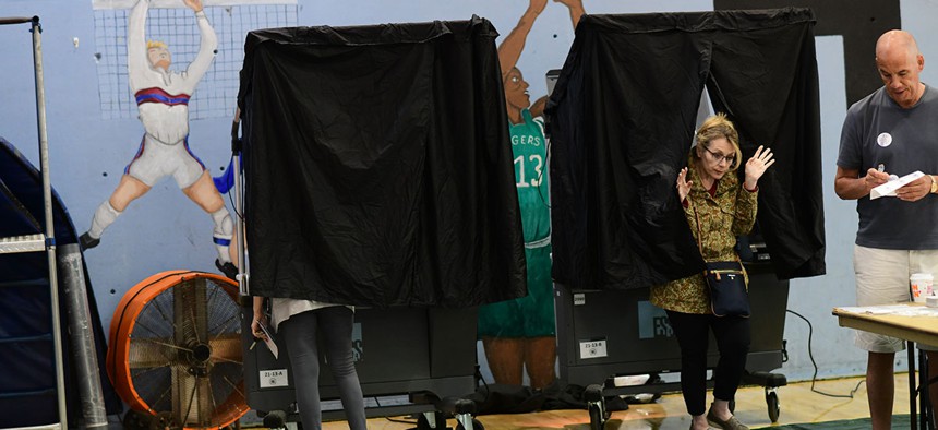 People cast their ballots at a polling location during the Pennsylvania primary election in Philadelphia.