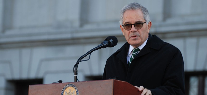 Philadelphia District Attorney Larry Krasner speaks outside the Pennsylvania Capitol building.