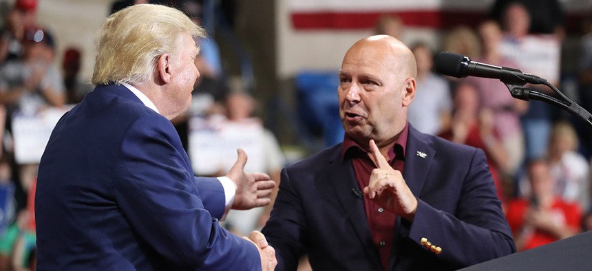 Pennsylvania Republican gubernatorial candidate Doug Mastriano is greeted by former president Donald Trump.