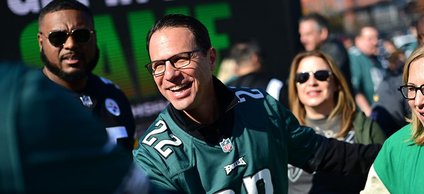 Democratic nominee for Governor Josh Shapiro tailgates with supporters before attending the game between the Philadelphia Eagles