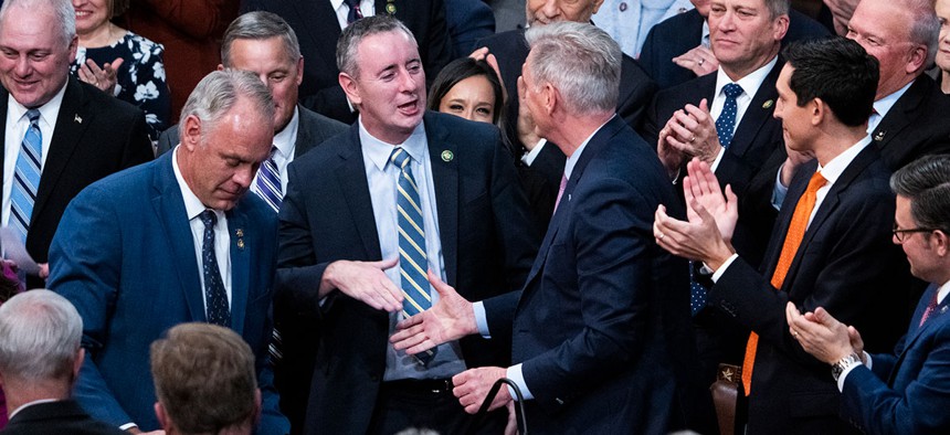 Fitzpatrick shakes hands with incoming House Speaker Kevin McCarthy on Saturday, Jan. 7.