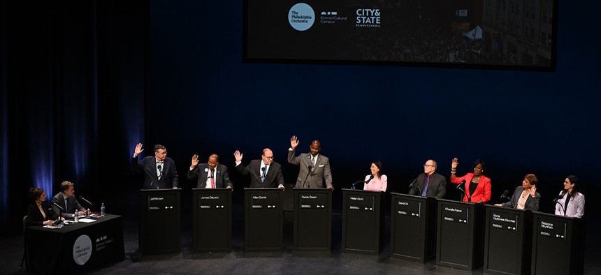 More than half the mayoral candidates raise their hands when asked if they owned a TikTok account.