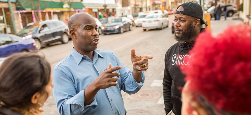 Derek Green speaks with Philadelphia residents on the campaign trail.