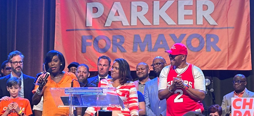 One major player in Parker’s success has been Campaign Manager Sinceré Harris (center).