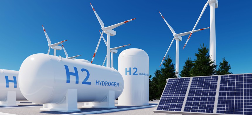 A hydrogen energy storage system alongside a solar power plant and wind turbines.