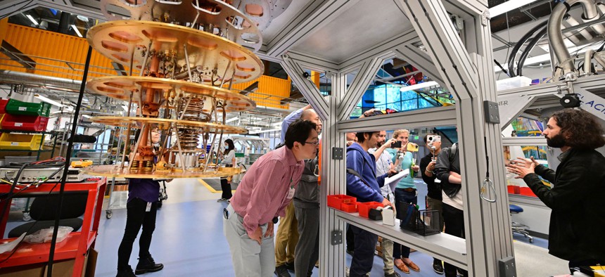 Dr. Erik Lucero, Lead Engineer of Google Quantum AI, leads media on a tour of the Quantum Computing Lab at the Quantum AI campus in Goleta, California.