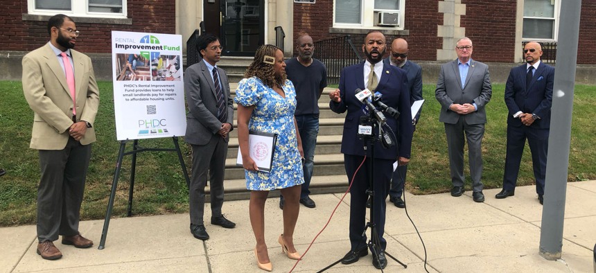 Philadelphia City Councilmembers Curtis Jones and Jamie Gauthier, Mayor Jim Kenney and state lawmakers speak to the press in West Philadelphia on Wednesday.