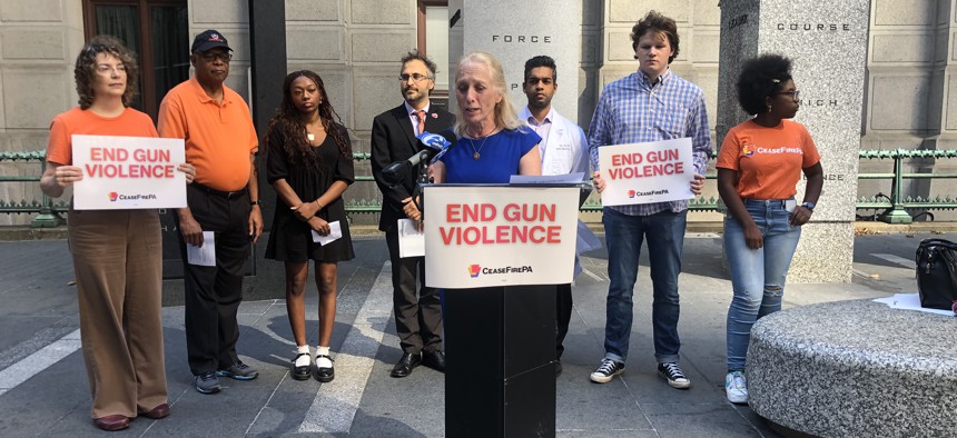 U.S. Rep. Mary Gay Scanlon and CeaseFirePA advocates speak to the press outside City Hall in Philadelphia