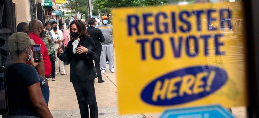 Democratic U.S. Vice Presidential nominee Sen. Kamala Harris greets people in the West Oak Lane neighborhood in Philadelphia on September 17, 2020.