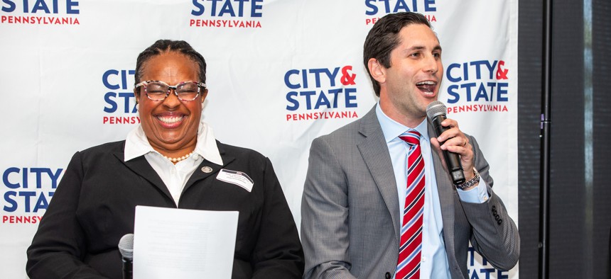 State Rep. Darisha Parker gets a kick out of Pennsylvania Health Care Association President and CEO Zachary Shamberg's answer to a question at the Greater Philadelphia Healthcare Summit