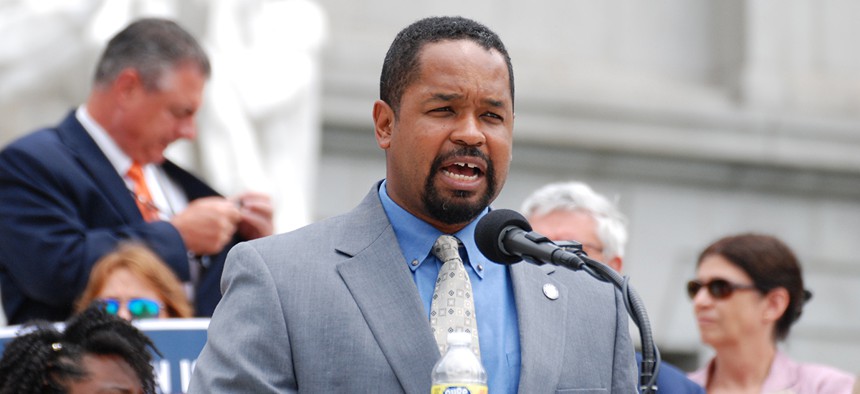 Pennsylvania Democratic Party Chair Sharif Street speaks outside the state Capitol. 