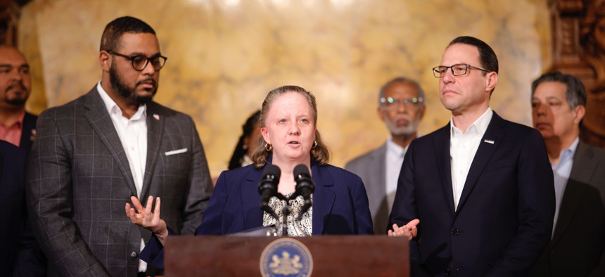 Sara Jacobson (center), director of the Public Defender Association of Pennsylvania and the chair of the Indigent Defense Advisory Committee, spoke at the committee’s first meeting on Monday