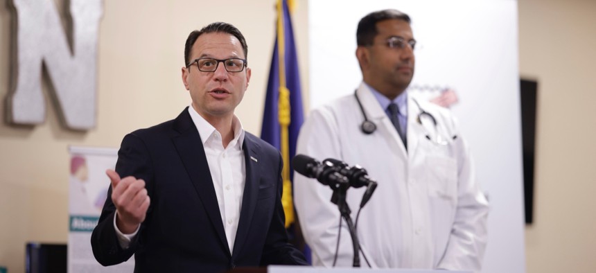 Gov. Josh Shapiro speaks at a press conference on medical debt relief in April 2024.