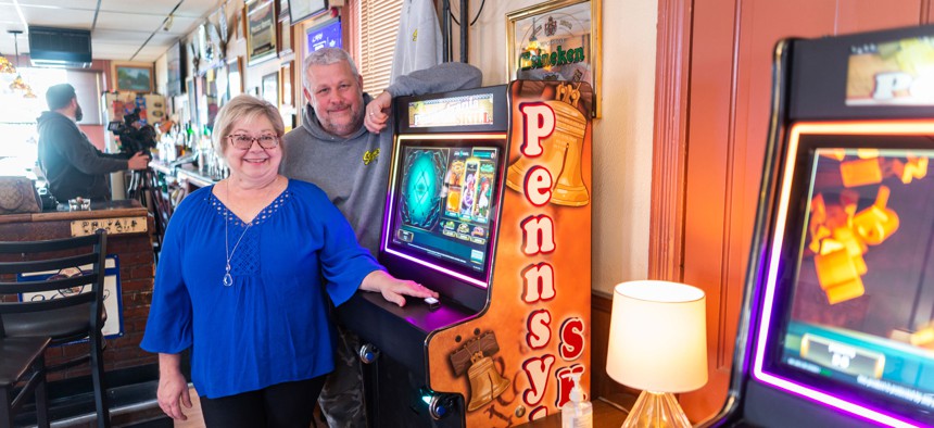 Local restaurant owners in Lebanon pose with Pennsylvania Skill games.