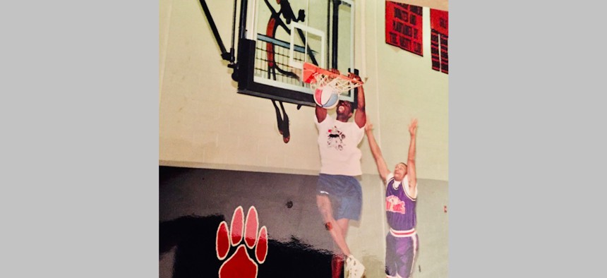 Future Education Secretary Khalid Mumin throws down during a game.