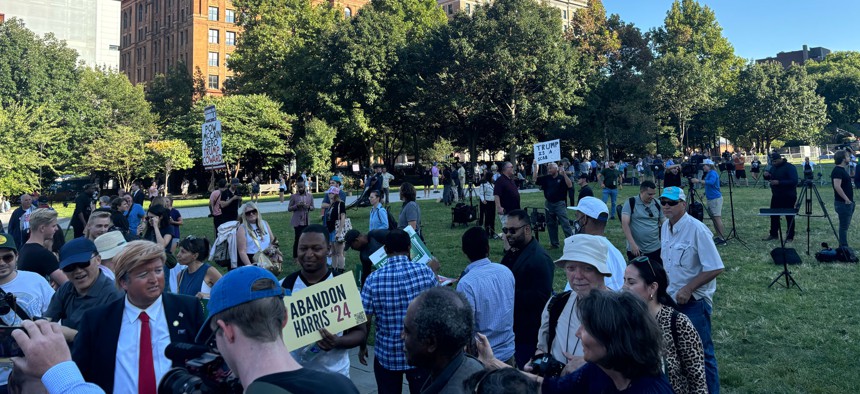 The greensward on Market Street between Fifth and Sixth streets was the locus for all manner of supporters, protesters, gadflies and merchants ahead of the presidential debate on Tuesday.