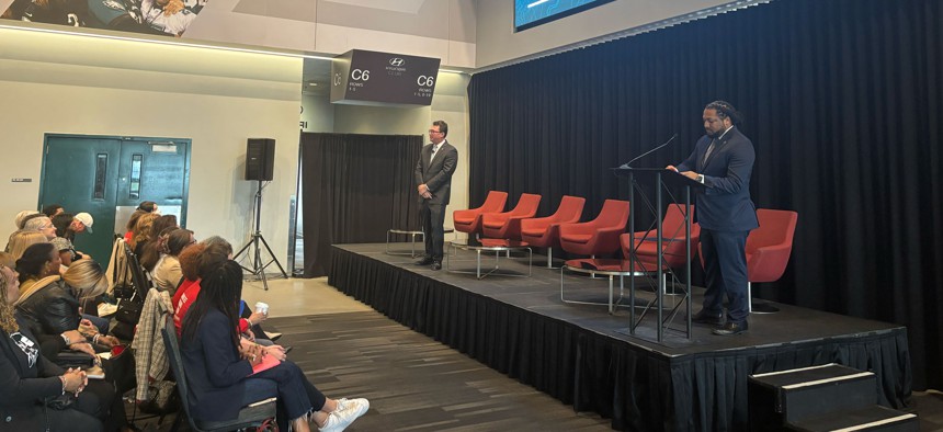 Rob Wilcox and Greg Jackson, directors of the White House Office of Gun Violence Prevention, speak at the Safer America Summit at Lincoln FInancial Field in Philadelphia.