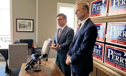 U.S. House Speaker Mike Johnson and U.S. Rep. Scott Perry speak with reporters in Mechanicsburg, Pennsylvania.