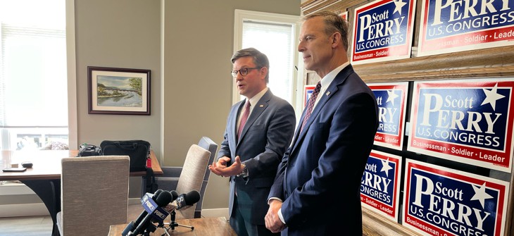 U.S. House Speaker Mike Johnson and U.S. Rep. Scott Perry speak with reporters in Mechanicsburg, Pennsylvania.