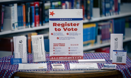 A table with voter registration information at a January 2024 event in Harrisburg, Pennsylvania. 