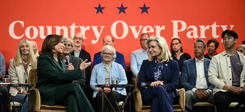 Vice President and Democratic presidential candidate Kamala Harris (L) speaks during a moderated conversation with former U.S. Rep. Liz Cheney in Malvern, Pennsylvania, on Oct. 21