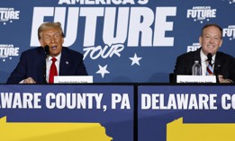 Republican presidential nominee, former U.S. President Donald Trump (L) participates in a roundtable discussion with former Republican U.S. Representative from New York Lee Zeldin at the Drexelbrook Catering & Event Center on October 29, 2024 in Drexel Hill, Pennsylvania