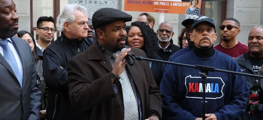 Flanked by, L-R, Philadelphia City Council President Kenyatta Johnson, Democratic City Committee Chair Bob Brady and state Sen. Vincent Hughes, Pennsylvania Democratic Party Chair aSharif Street addresses a get out the vote rally at Philadel;hia City Hall.