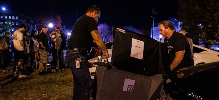 Workers deliver an additional voting machine to the polling location in the Banana Factory in the 3rd Ward of Bethlehem, Pennsylvania on November 5, 2024.