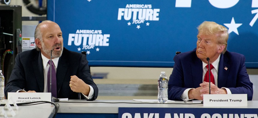 Then-presidential candidate Donald Trump speaks at a roundtable event with Howard Lutnick.