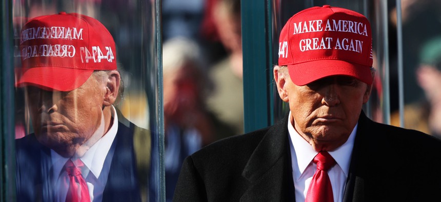 President-elect Donald Trump walks off stage after speaking during a campaign rally at Lancaster Airport on November 03, 2024 in Lititz, Pennsylvania