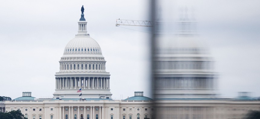 The Capitol Building seen from the National Mall in Washington DC.