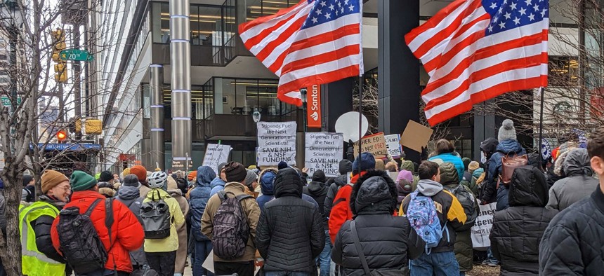 More than 200 unionized graduate students, researchers, university faculty, and their supporters rallied on Wednesday in front of U.S. Sen. Dave McCormick's Philadelphia office.