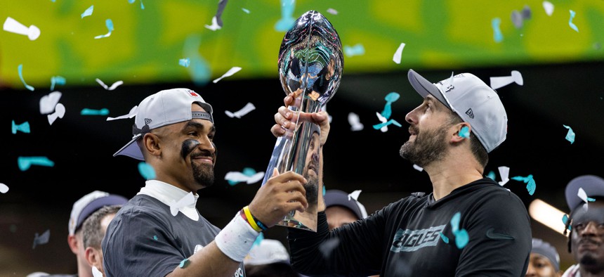 Philadelphia Eagles quarterback Jalen Hurts and Eagles head coach Nick Sirianni lift the Vince Lombardi Trophy following Super Bowl LIX against the Kansas City Chiefs at Caesars Superdome on February 09, 2025 in New Orleans, Louisiana.