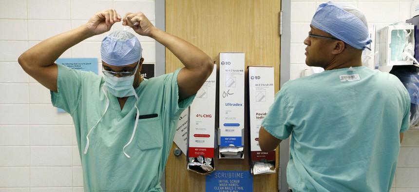 Drs. Vince and Vance Moss in happier times at the Crozer-Chester Medical Center in Upland.