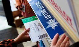 A Pennsylvania voter submits their mail ballot in Bucks County, Pennsylvania.